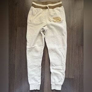 Roots Cream Sweatpants with Gold Logo